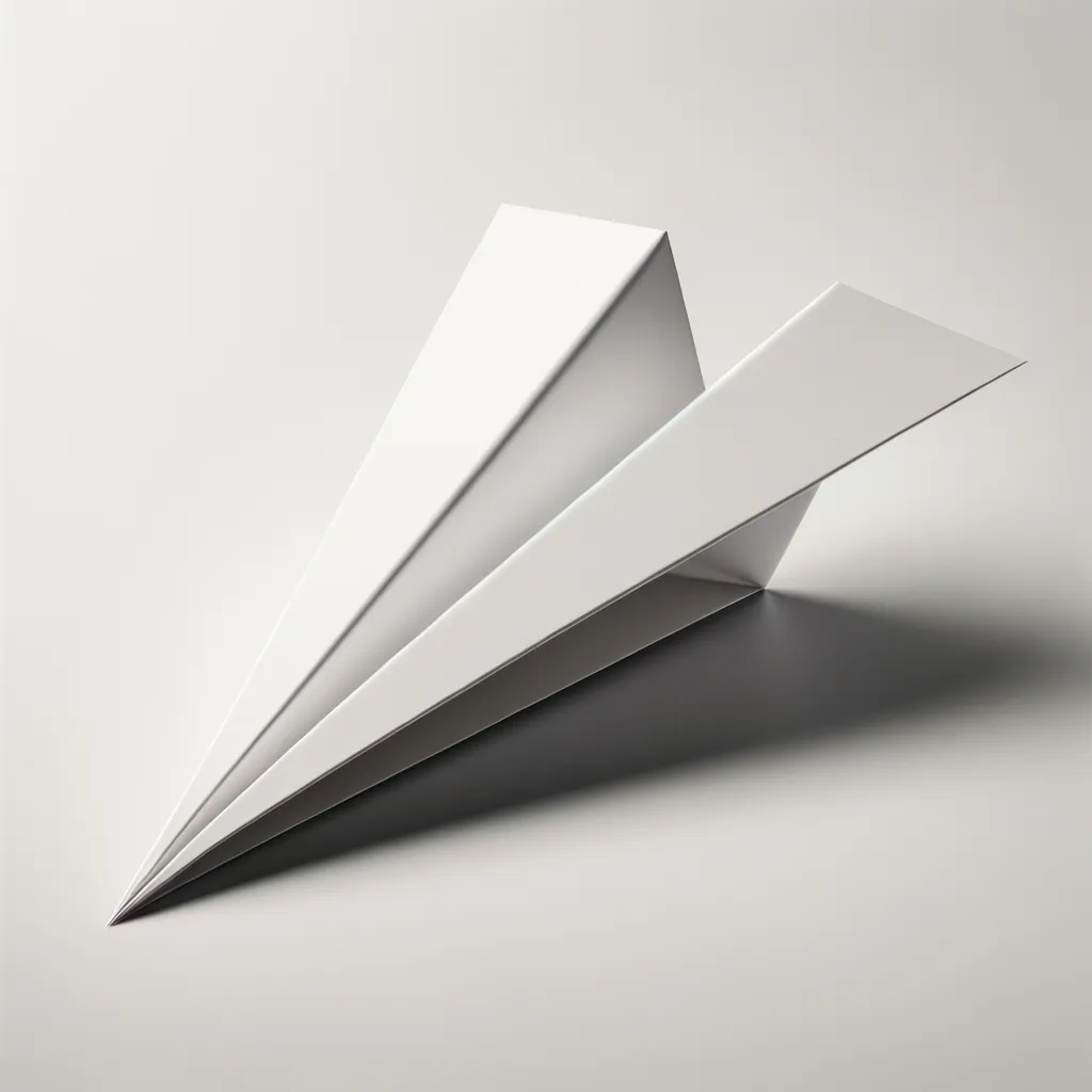 Un avion en papier classique à nez pointu, plié à partir d'une simple feuille